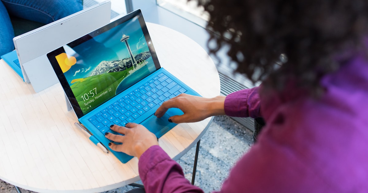 Technology executive reviewing strategy with growing business team